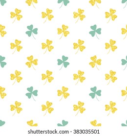 Glittering gold clover seamless pattern on white background. Seamless background for greeting card for St. Patrick's day. Recurring pattern of clove flower -  sign of the St. Patrick's day. eps