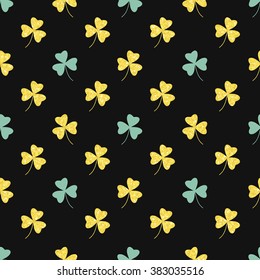 Glittering gold clover seamless pattern on black background. Seamless background for greeting card for St. Patrick's day. Recurring pattern of clove flower -  sign of the St. Patrick's day. eps