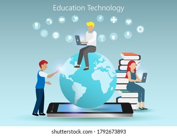 Global education technology concept. Group of college/ university students studying on laptop computer with virtual globe on digital smart phone and graphical user interface icons in blue background.