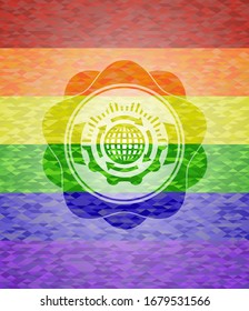 globalization icon inside emblem on mosaic background with the colors of the LGBT flag