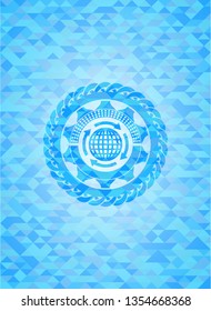 globalization icon inside light blue emblem with triangle mosaic background