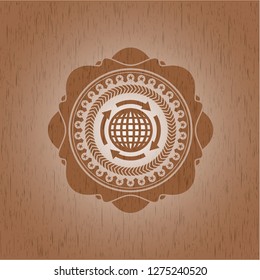 globalization icon inside wood emblem