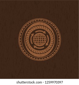 globalization icon inside wooden emblem