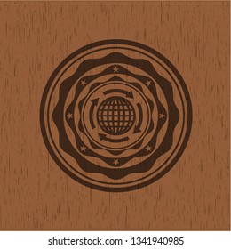 globalization icon inside wooden emblem