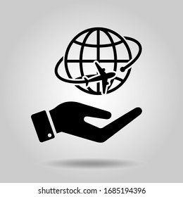 globe and airplane icon in hand
