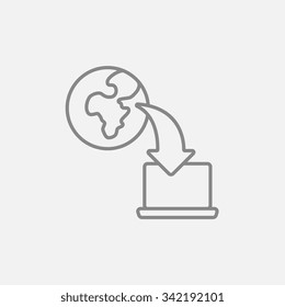Globe with an arrow pointing at laptop line icon for web, mobile and infographics. Vector dark grey icon isolated on light grey background.