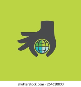 Globe icon with hand, vector illustration. Flat design style.