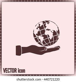 Globe icon with hand, vector illustration.
