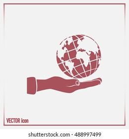 Globe icon with hand, vector illustration.