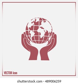 Globe icon with hand, vector illustration.