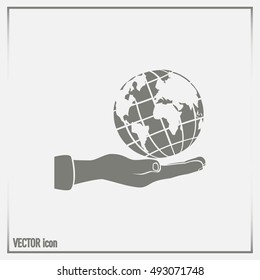 Globe icon with hand, vector illustration.
