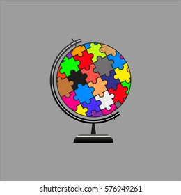 Globe made from puzzles on a gray background. vector illustration