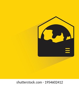globe in mail with shadow on yellow background