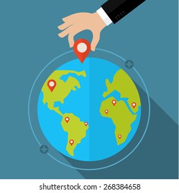 Globe with markers, hand holds label. Flat style, vector illustration