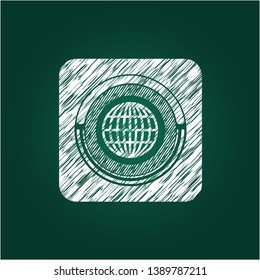 globe, website icon inside chalkboard emblem written on a blackboard