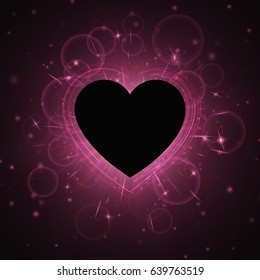 Glossy background with light flare. A bright iridescent frame in the shape of a heart on a dark backdrop.