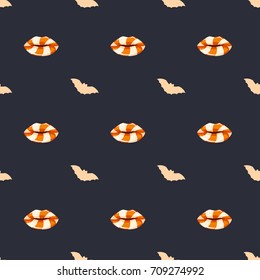 Glossy candy lips and bat seamless pattern isolated on dark background.