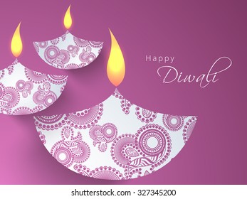Glossy floral decorated illuminated lit lamps on purple background for Indian Festival of Lights, Happy Diwali celebration.