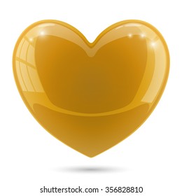 Glossy gold heart isolated on white background.