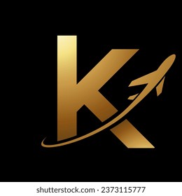 Glossy Gold Lowercase Letter K Icon with an Airplane on a Black Background