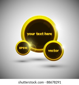 Glossy golden speech bubble with black glass inside