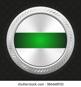 Glossy green badge with silver border on black background