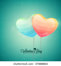 Glossy heart shaped balloons flying on shiny background for Happy Valentine's Day celebration.