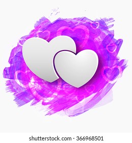 Glossy hearts on paint stroke background for Happy Valentine's Day celebration.