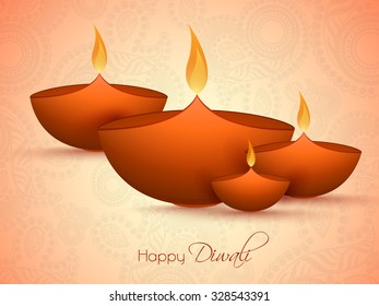 Glossy illuminated oil lit lamps on floral decorated background for Indian Festival of Lights, Happy Diwali celebration.