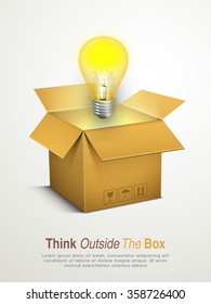 Glossy light bulb coming out from an open box for Business Idea concept.