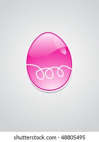 glossy magenta easter egg with grey background