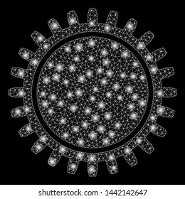Glossy mesh cogwheel with sparkle effect. Abstract illuminated model of cogwheel icon. Shiny wire frame polygonal mesh cogwheel. Vector abstraction on a black background.