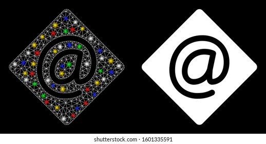 Glossy mesh email icon with glare effect. Abstract illuminated model of email. Shiny wire carcass polygonal network email icon. Vector abstraction on a black background.