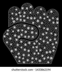 Glossy mesh fist with glare effect. Abstract illuminated model of fist icon. Shiny wire frame triangular network fist. Vector abstraction on a black background.