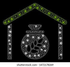 Glossy mesh grain storage with glare effect. Abstract illuminated model of grain storage icon. Shiny wire carcass triangular mesh grain storage. Vector abstraction on a black background.