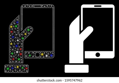 Glossy mesh hand holds smartphone icon with glow effect. Abstract illuminated model of hand holds smartphone. Shiny wire carcass polygonal network hand holds smartphone icon.