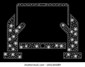Glossy mesh hands hold tablet with glare effect. Abstract illuminated model of hands hold tablet icon. Shiny wire frame polygonal mesh hands hold tablet. Vector abstraction on a black background.
