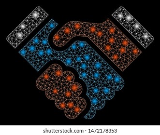 Glossy mesh handshake with glow effect. Abstract illuminated model of handshake icon. Shiny wire frame triangular mesh handshake. Vector abstraction on a black background.
