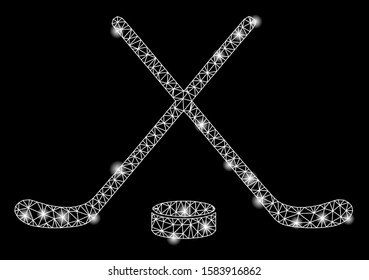 Glossy mesh hockey with glitter effect. Abstract illuminated model of hockey icon. Shiny wire carcass polygonal mesh hockey. Vector abstraction on a black background.