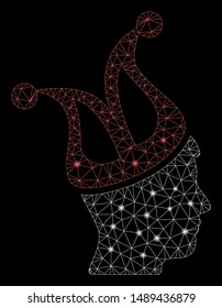Glossy mesh joker guy with sparkle effect. Abstract illuminated model of joker guy icon. Shiny wire carcass triangular mesh joker guy. Vector abstraction on a black background.