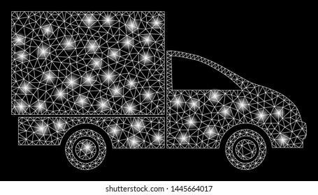 Glossy mesh lorry with glitter effect. Abstract illuminated model of lorry icon. Shiny wire carcass polygonal mesh lorry. Vector abstraction on a black background.
