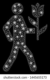 Glossy mesh lover with flower with glare effect. Abstract illuminated model of lover with flower icon. Shiny wire frame polygonal mesh lover with flower. Vector abstraction on a black background.