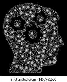 Glossy mesh mind gears with lightspot effect. Abstract illuminated model of mind gears icon. Shiny wire frame polygonal mesh mind gears. Vector abstraction on a black background.