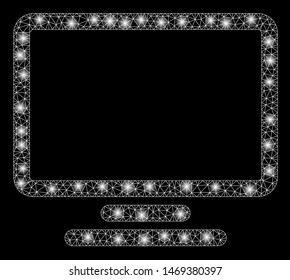 Glossy mesh monitor with glare effect. Abstract illuminated model of monitor icon. Shiny wire frame triangular mesh monitor. Vector abstraction on a black background.