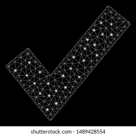 Glossy mesh OK tick with glare effect. Abstract illuminated model of OK tick icon. Shiny wire carcass triangular network OK tick. Vector abstraction on a black background.