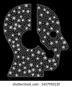 Glossy mesh operator with glitter effect. Abstract illuminated model of operator icon. Shiny wire frame triangular mesh operator. Vector abstraction on a black background.