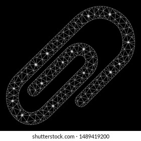 Glossy mesh paperclip with sparkle effect. Abstract illuminated model of paperclip icon. Shiny wire frame triangular mesh paperclip. Vector abstraction on a black background.