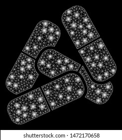 Glossy mesh pills with lightspot effect. Abstract illuminated model of pills icon. Shiny wire carcass triangular mesh pills. Vector abstraction on a black background.