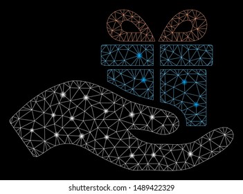 Glossy mesh present with glare effect. Abstract illuminated model of present icon. Shiny wire carcass polygonal mesh present. Vector abstraction on a black background.