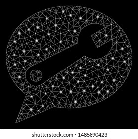 Glossy mesh service message with lightspot effect. Abstract illuminated model of service message icon. Shiny wire frame triangular network service message. Vector abstraction on a black background.